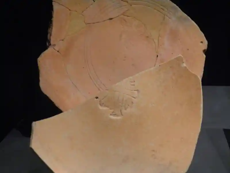 Cross on a terracotta plate